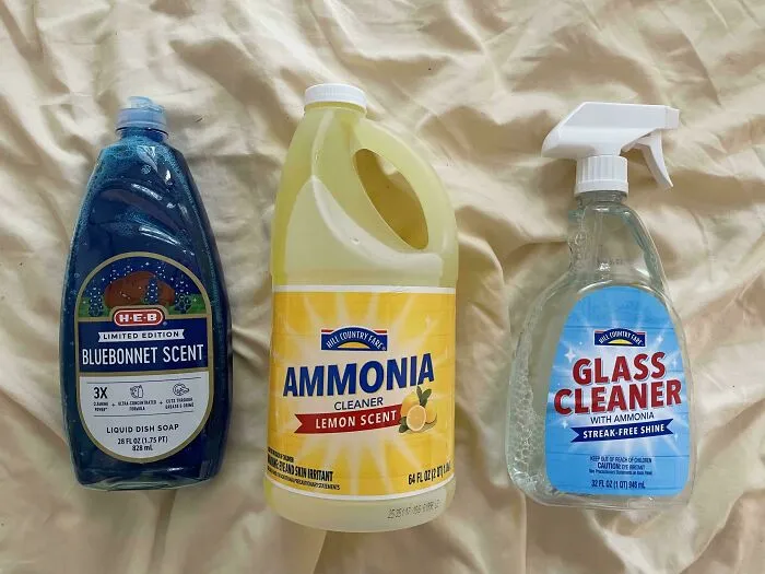 Three household cleaning supplies lined up as part of smart and economical frugal tips.
