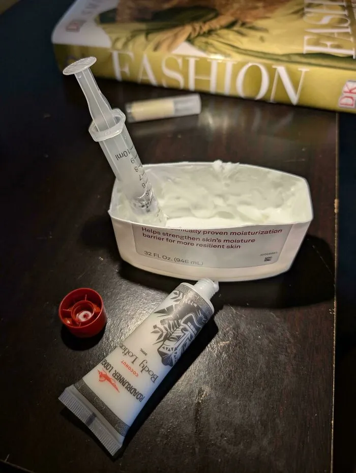 Using a syringe to transfer lotion for simple frugal tips and saving money.