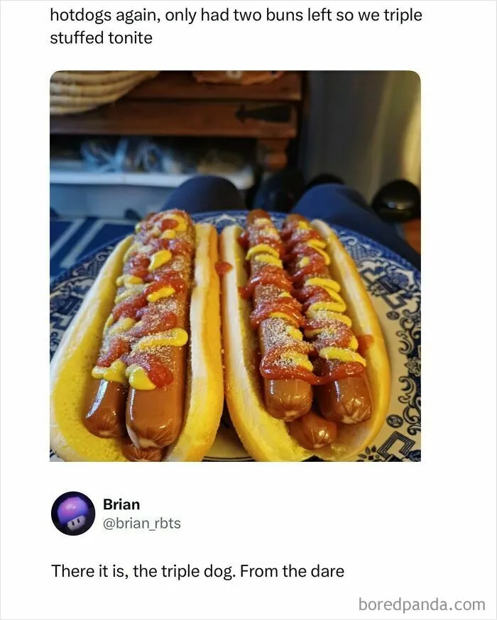 Triple hotdogs with ketchup and mustard in two buns on a patterned plate