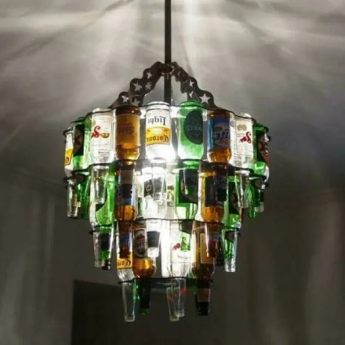 A multi-tiered chandelier made from recycled beer bottles as awful creations.
