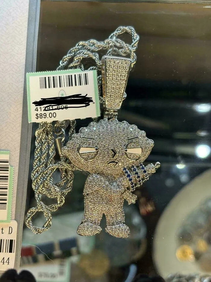A silver diamond-encrusted Stewie Griffin necklace, an awful creation too well-made to ignore.