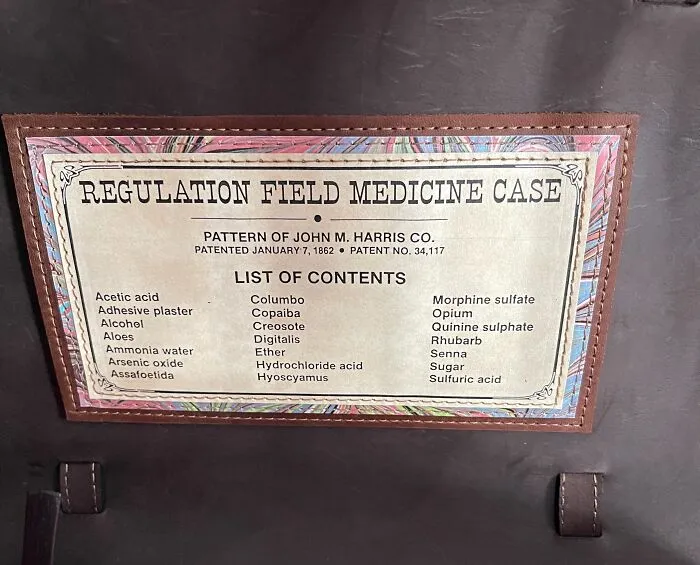 Antique field medicine case contents label showing how much medicine has changed in history