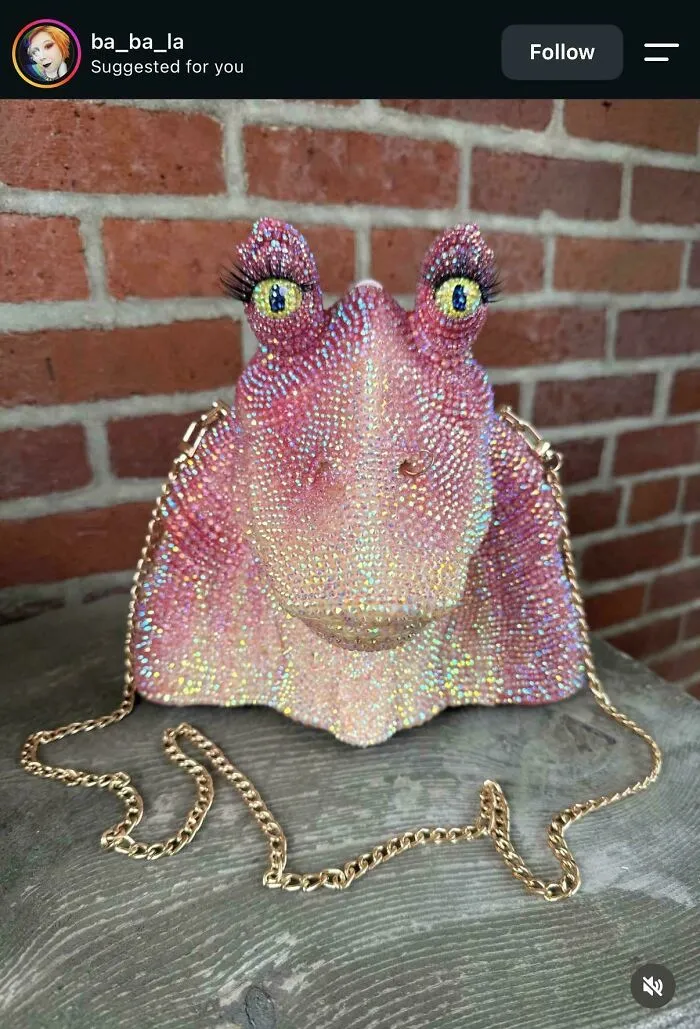 A sparkly, bedazzled purse shaped like Jar Jar Binks, an awful creation crafted with extreme detail.