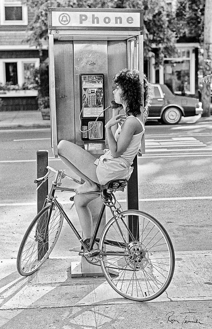 A Woman Using A Pay Phone In 1980s On City Island In The Bronx, New York. Photo By Ron Terner