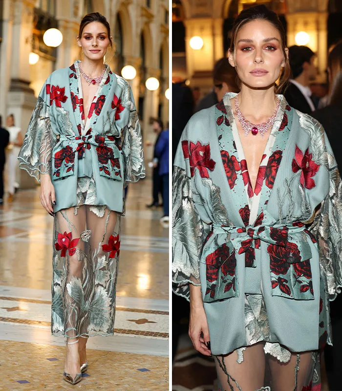 Woman in floral embroidered dress at Plastic Surgery Expo fashion event