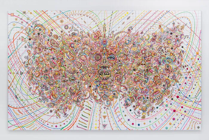 Intricate, colorful, butterfly-shaped psychedelic wall art piece from unusual sculptures.