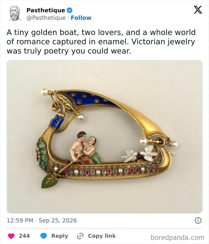 An ornate golden boat brooch showcasing aesthetic art depicting two lovers in colorful enamel.