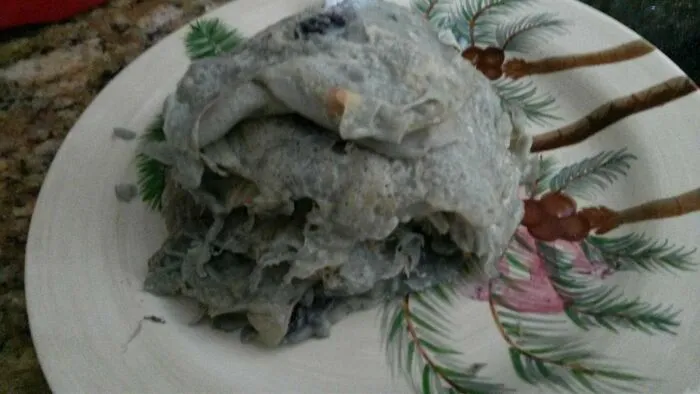 Unappetizing grayish crepe pile cooking fail