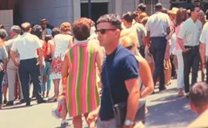 Flipping Through The Old Disneyland Photos, Woman Spots A "Time Traveler,” Goes Viral On TikTok