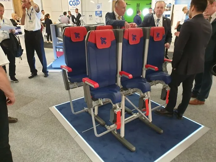 Extremely narrow and cramped prototype airplane seats as a terrible product design example