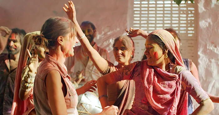Women dancing, celebrating with color, having turned down marriage proposals and knowing they made the right choice.