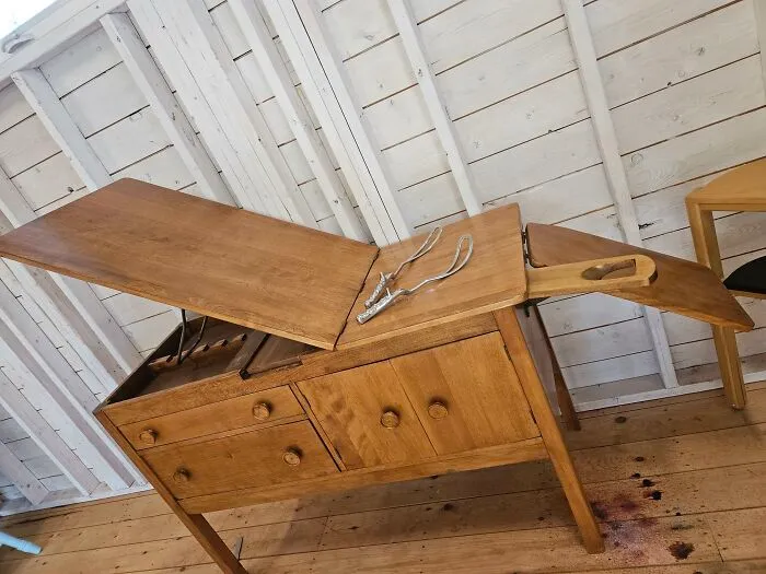 An antique wooden medical table showing how medicine has changed throughout history