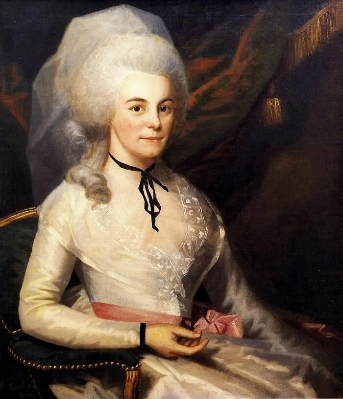 18th-century painting of a woman in a white dress, elaborate wig, and a black choker, representing women in history.