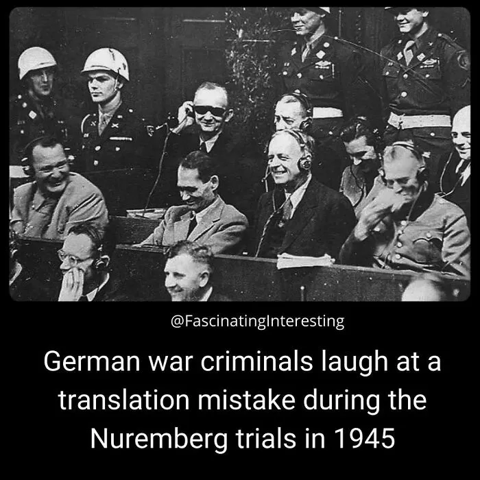 Black and white photo of German war criminals laughing during Nuremberg trials
