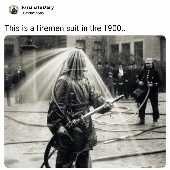 Firemen suit used in 1900s with water spray and hose in use