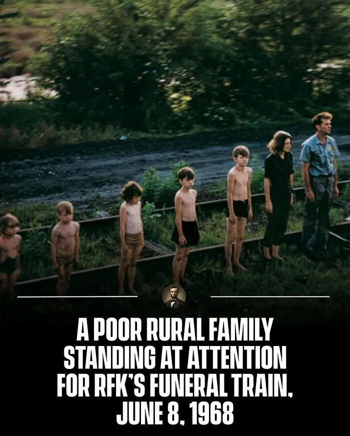 Rural family standing for RFK funeral train in 1968. Captivating photos from history.