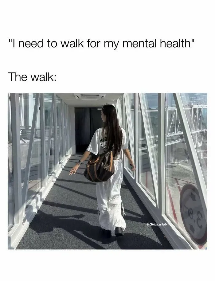 Woman walking down an airport jet bridge representing funny memes about being a woman.