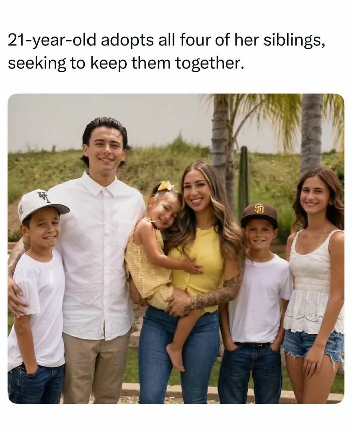 A heartening random find on social media showing a 21-year-old posing outdoors with her four adopted siblings