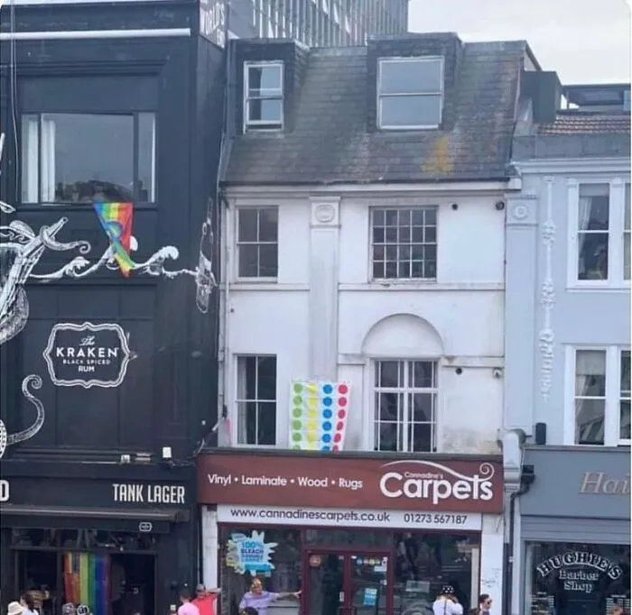 “Where’s The Pride Flag?”  “Who Knows. Just Put Out The Twister Mat.”