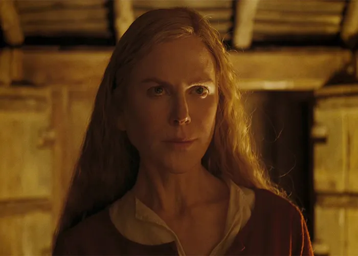 Nicole Kidman in a historical film setting, highlighting Hollywood's plastic surgery obsession.