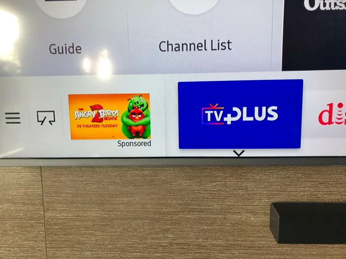 An ad for Angry Birds on a smart TV dashboard, showing a terrible product design with unwanted ads in the UI.