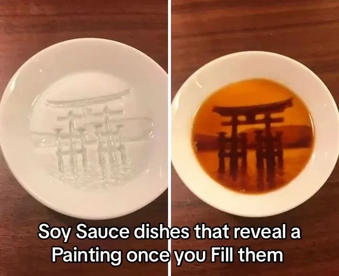 Soy sauce dish that reveals Japanese torii gate painting when filled for clever designs