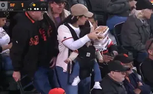 A Giants Game Camera Finds Mom Carrying Baby And Food, But The Dad Sitting Nearby Gets Attention