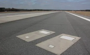 Georgian Airport Has Two Graves On Its Busiest Runway, And The Story Behind Them Is Wild