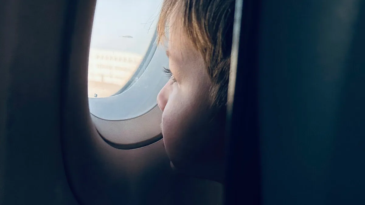 Woman Pays For Window Seat On Airplane, Baffled When She Finds A Kid Already In It