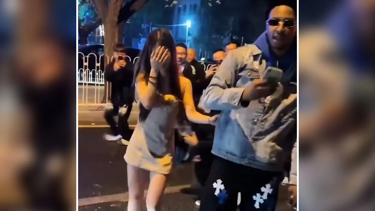 Crowd Surrounds Woman In Public For Dating A Foreigner As Disturbing New "Shaming Trend" Spreads