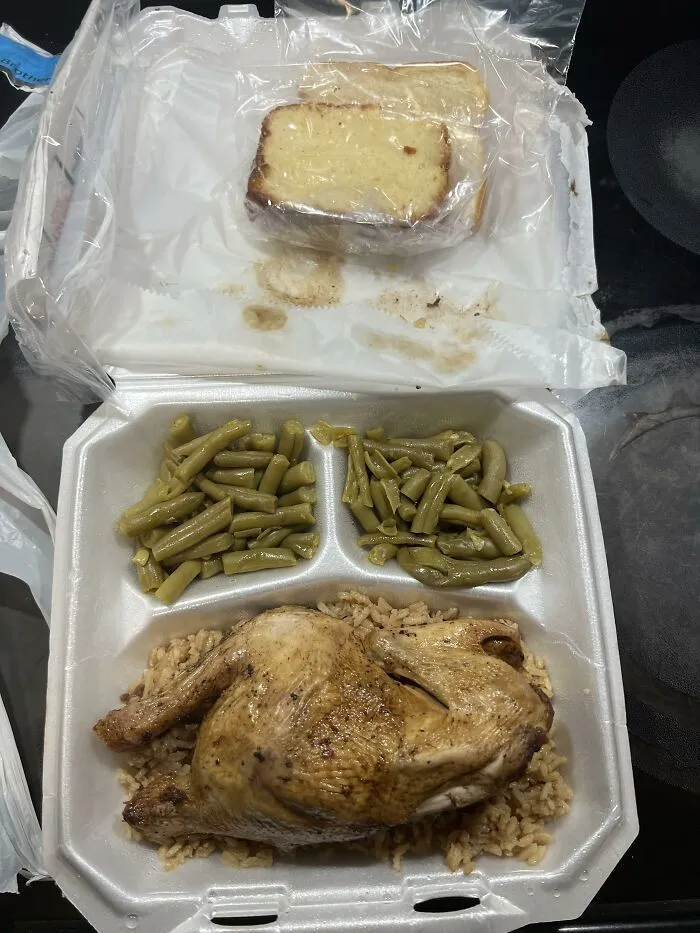 Weird food combinations of roasted chicken, green beans, and a slice of cake in a takeout container