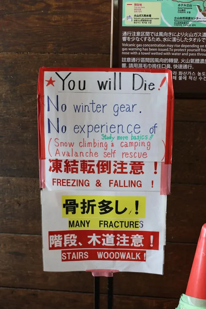 Japanese trail warning sign with humorous English translation saying You will Die, a sign that looks like a mistake.