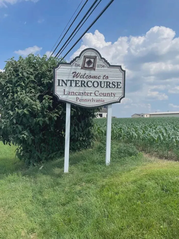 A Welcome to Intercourse sign in Lancaster County, Pennsylvania, showing funny town names