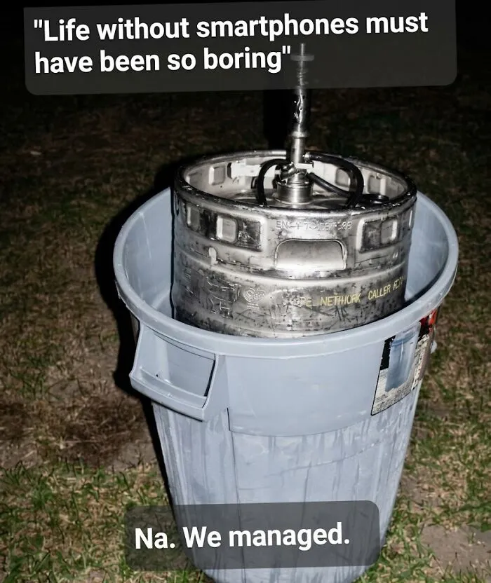 Old beer keg in trash bin with quote about life without smartphones