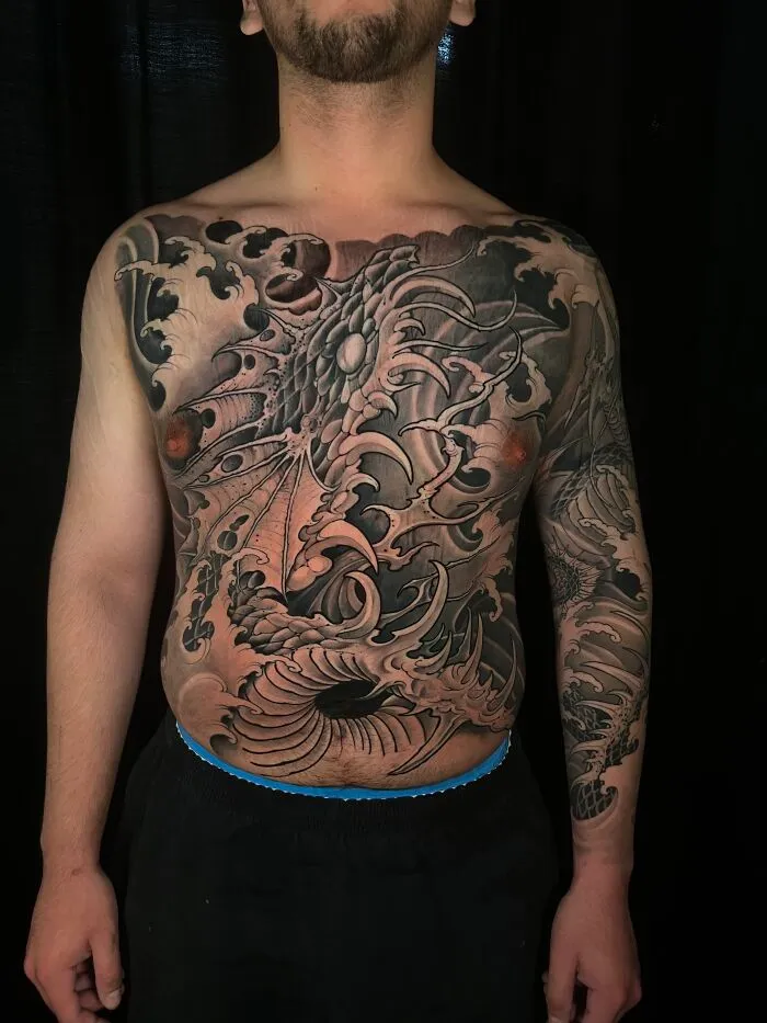 A Dragon Carved In Waves