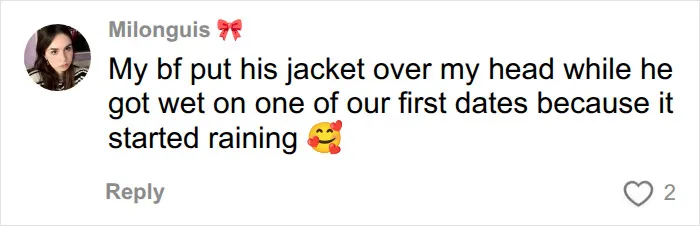A man holding his jacket over a woman in the rain, illustrating how men should treat women with care.