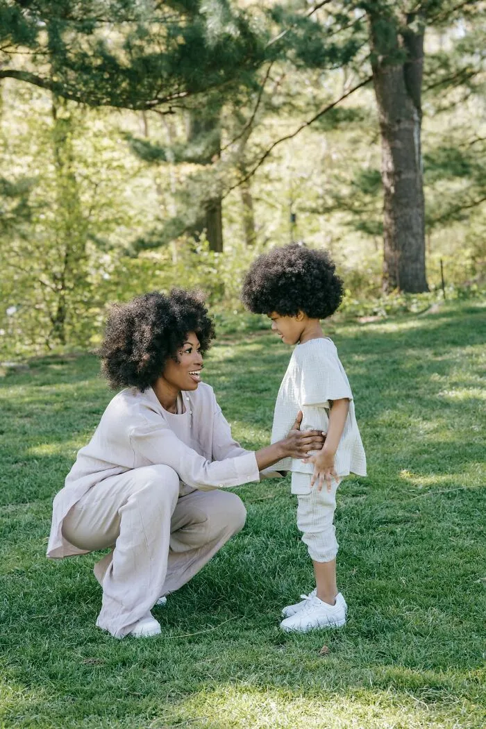 A loving mother and child outdoors, reflecting on what matters when marriages collapsed