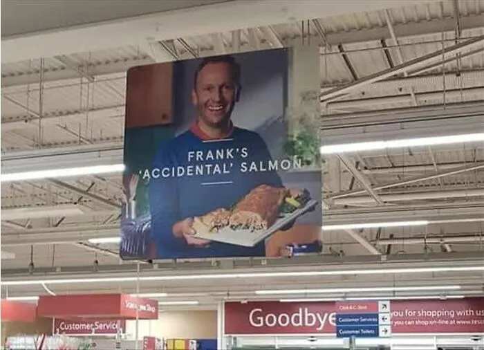 An in-store supermarket banner showing misused quotation marks around the word accidental in a food ad.