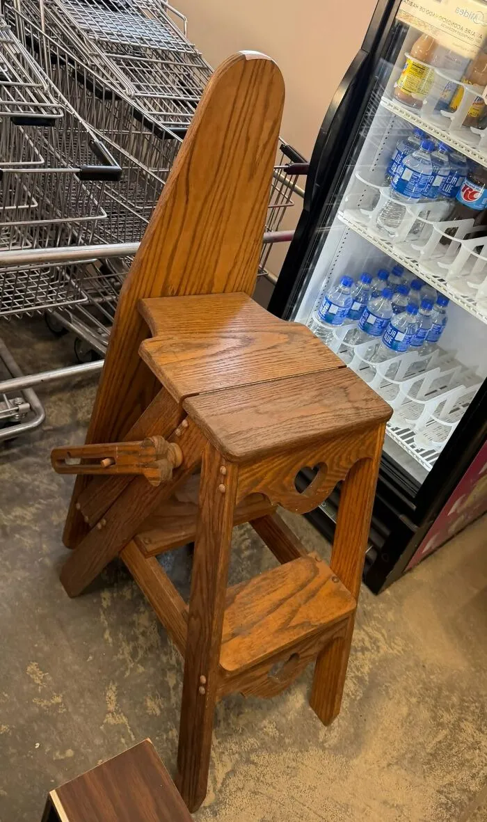 Thrift store oak wooden step stool with cutout heart design