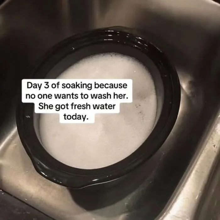 Cursed image of a soaking container filled with water in a sink labeled day 3 of soaking