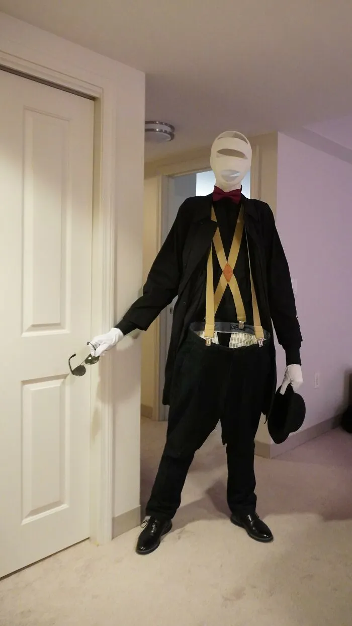 An invisible man costume with bandages and suspenders representing creative Halloween costume ideas.