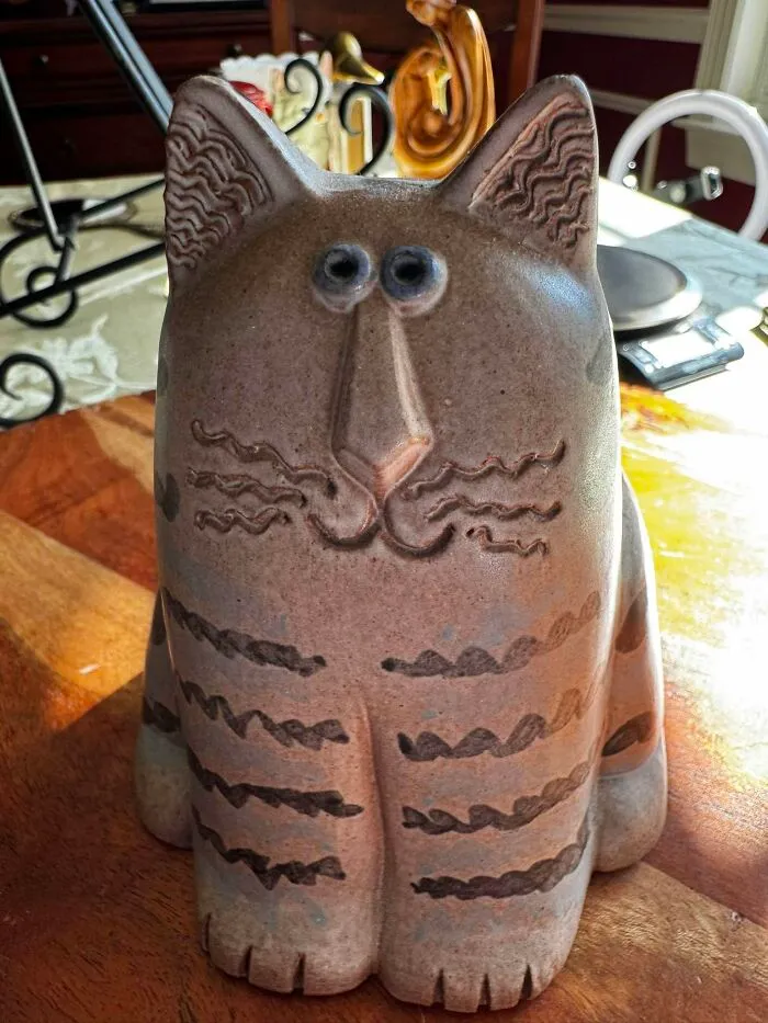 Pottery cat statue with blue eyes thrift store decorative item