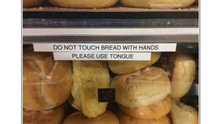 Bakery label with translation fail reading, Do not touch bread with hands please use tongue.