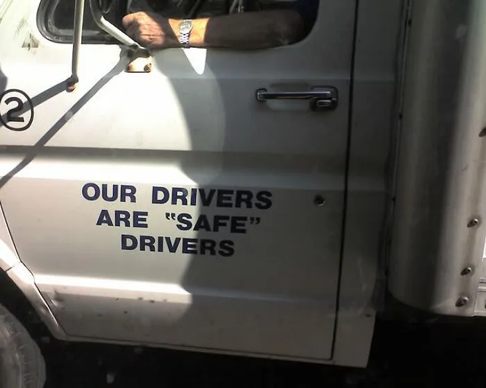 Truck door displaying text with misused quotation marks around the word safe.