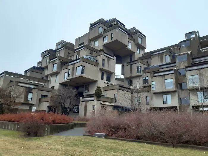 The Habitat 67 complex showcasing bizarre shapes and modular concrete blocks in architecture.