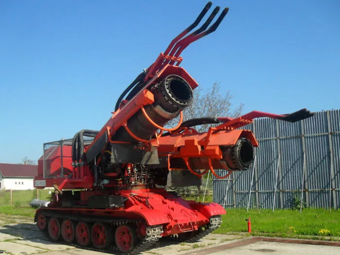 Massive red firefighting tank with jet engines attached, featured among wonderful vehicles.