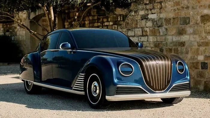Sleek dark blue vintage custom car parked outside, exemplary of weird and wonderful vehicles.