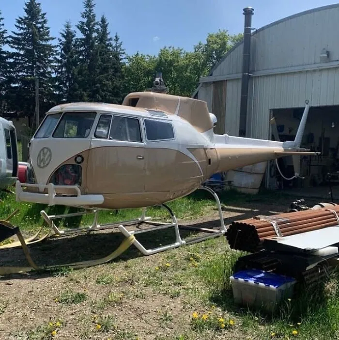 A unique helicopter custom-built with a vintage Volkswagen van body, showing weird and wonderful vehicles.
