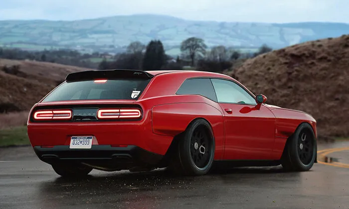 Rear view of a modified red Dodge Challenger muscle car, showing weird and wonderful vehicles design.