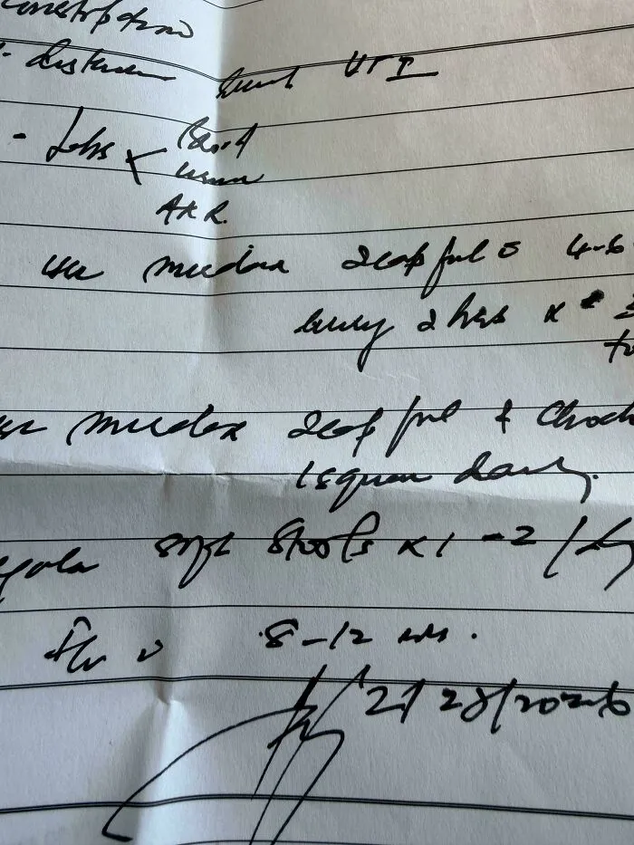 Unreadable doctor handwriting on a prescription sheet showcasing things went wrong pics with medical notes.